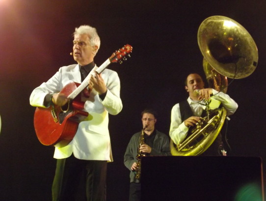 David Byrne sings on stage