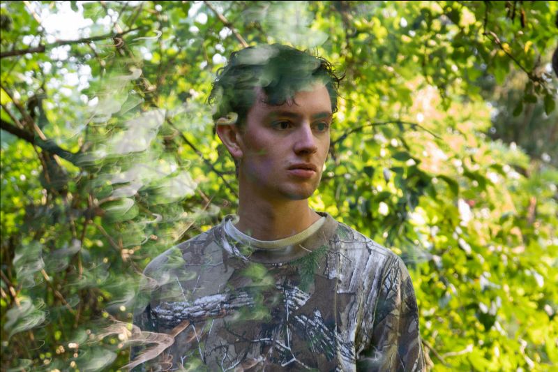 Kinbote press shot in trees