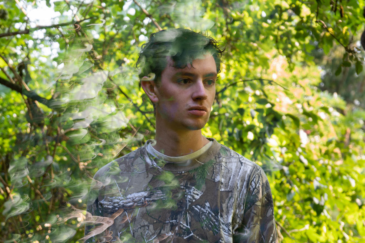 Kinbote press shot in trees